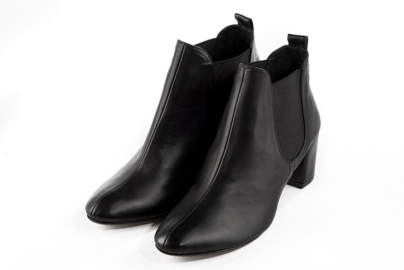 Satin black women's ankle boots, with elastics. Round toe. Medium block heels. Front view - Florence KOOIJMAN